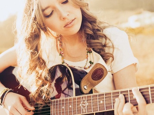 Come imparare a suonare canzoni con la chitarra?