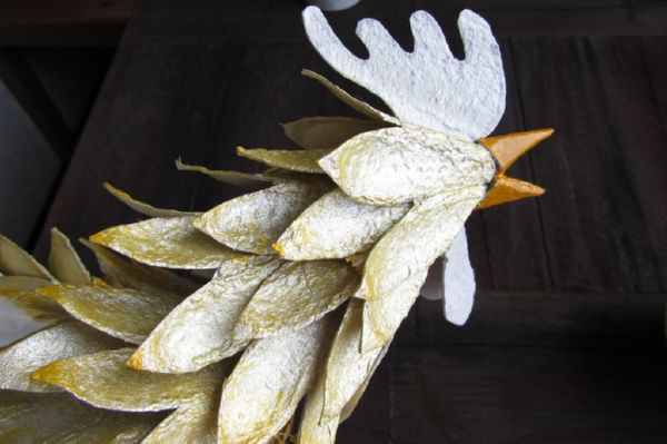 Gallo con le sue mani