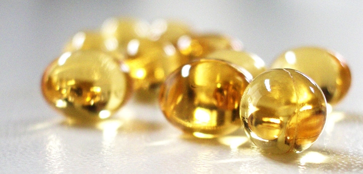Vitamina E nelle capsule del viso e dei capelli